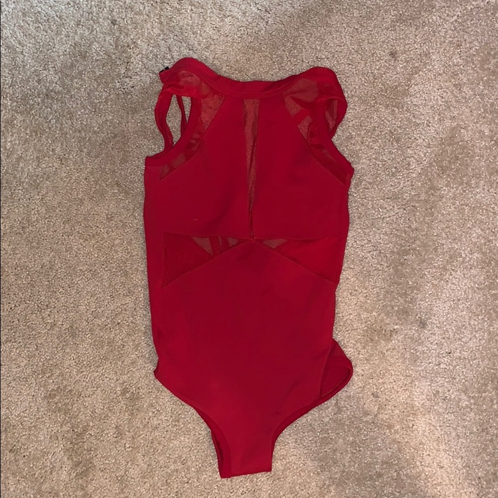 red ballerina leotard with design